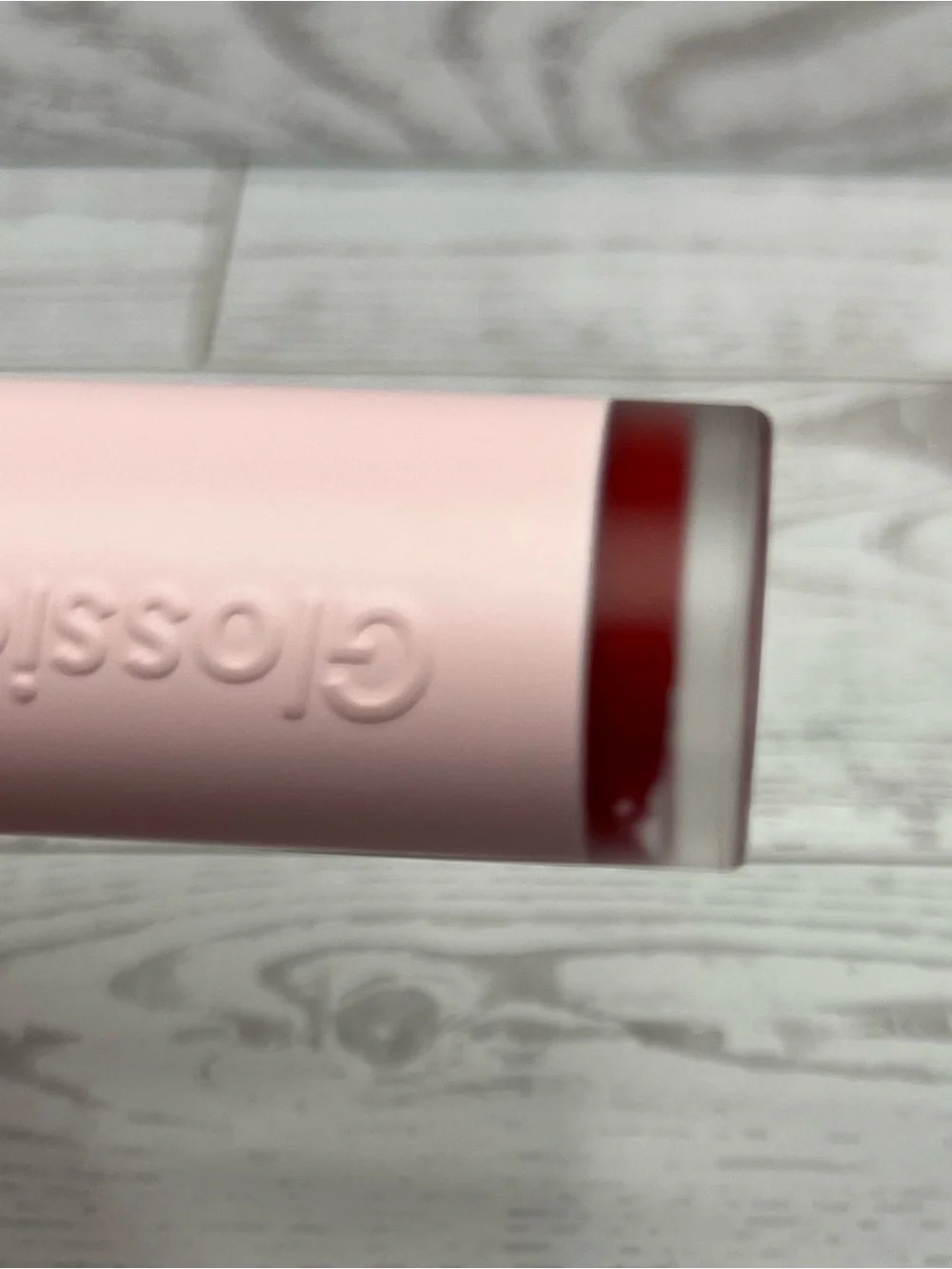 Glossier G suit, soft touch lip cream, shade JET
